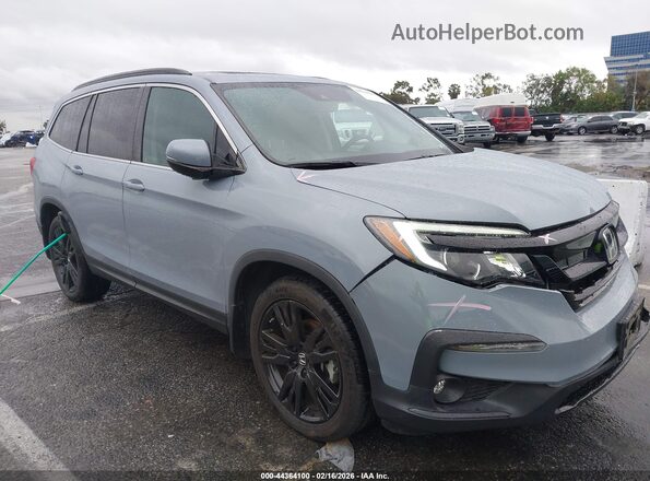 5FNYF5H2XNB018017 2022 HONDA PILOT Gray Rear interior view