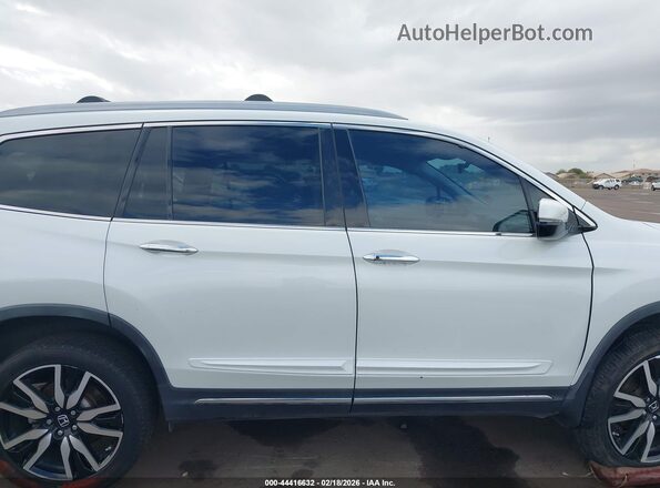 5FNYF6H65LB048791 2020 HONDA PILOT White Rear interior view