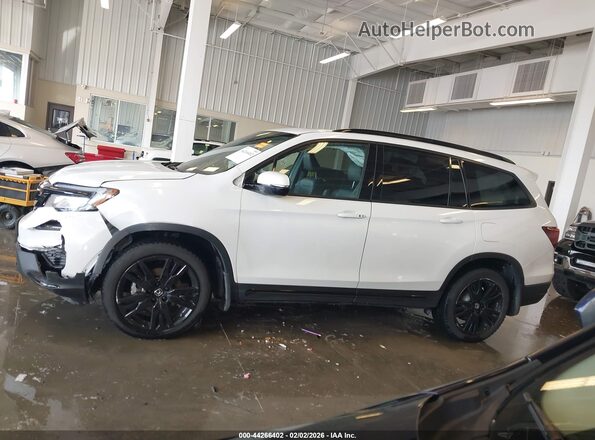 5FNYF6H75MB042192 2021 HONDA PILOT White 360 interior view