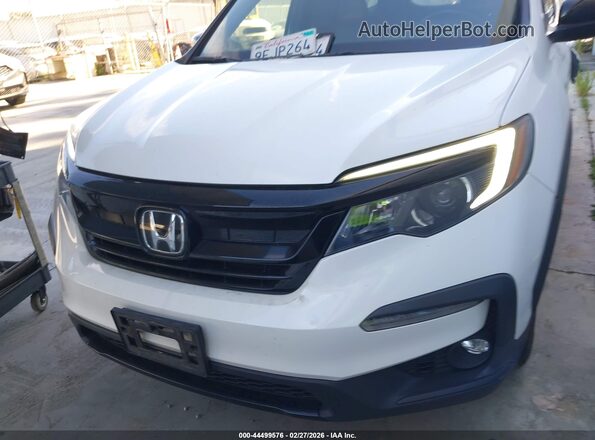 5FNYF6H88NB082602 2022 HONDA PILOT White Rear interior view