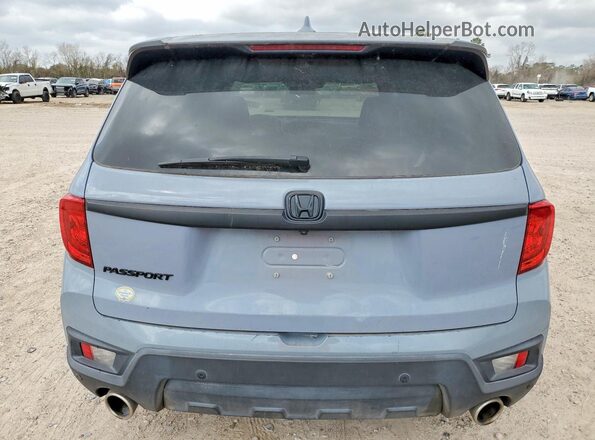 5FNYF7H59NB002753 2022 HONDA PASSPORT Gray Rear view