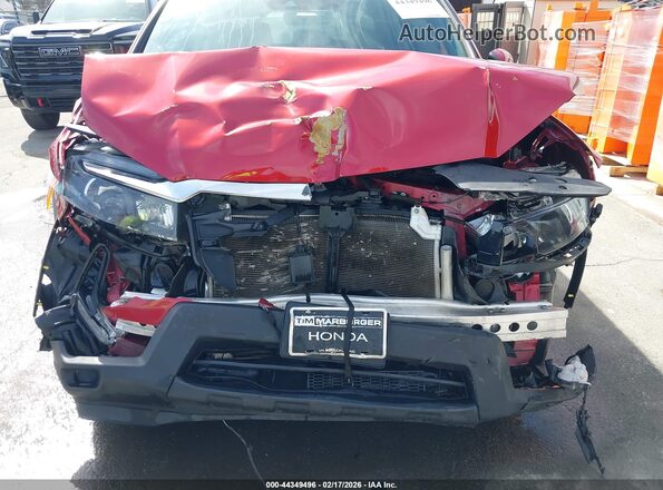 5FNYF8H56PB020040 2023 HONDA PASSPORT Red Front view