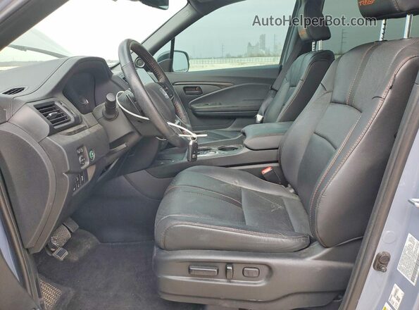 5FNYF8H62RB014960 2024 HONDA PASSPORT Синий Вид салона спереди
