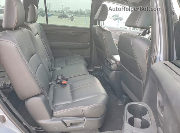 5FNYF8H62RB014960 2024 HONDA PASSPORT Синий Вид задней части салона