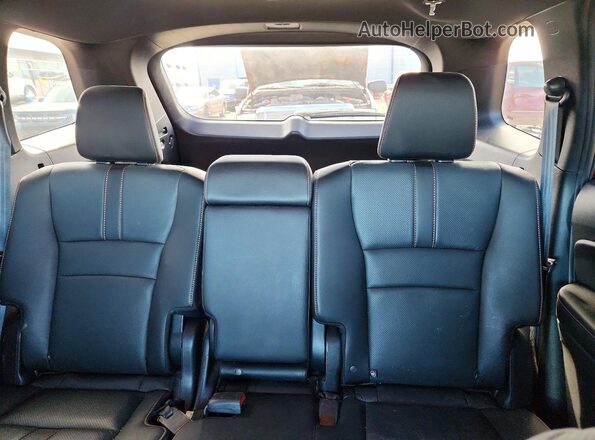 5FNYF8H66PB001593 2023 HONDA PASSPORT Red Widok tylnych siedzeń