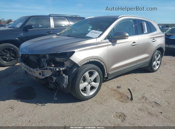 5LMCJ1C91JUL33014 2018 LINCOLN MKC Tan წინა მარცხენა ხედი სამი მეოთხედიდან