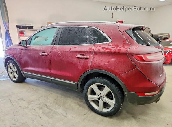 5LMCJ1D91GUJ19101 2016 LINCOLN MKC Maroon Trasero izquierdo