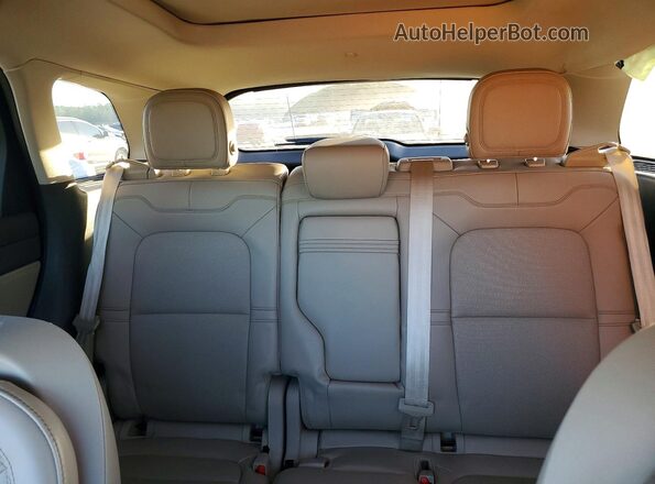 5LMCJ1D91LUL15436 2020 LINCOLN CORSAIR Red Rear seats view