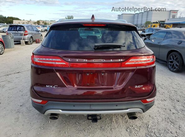 5LMCJ2C98HUL32796 2017 LINCOLN MKC Maroon Widok wnętrza z przodu