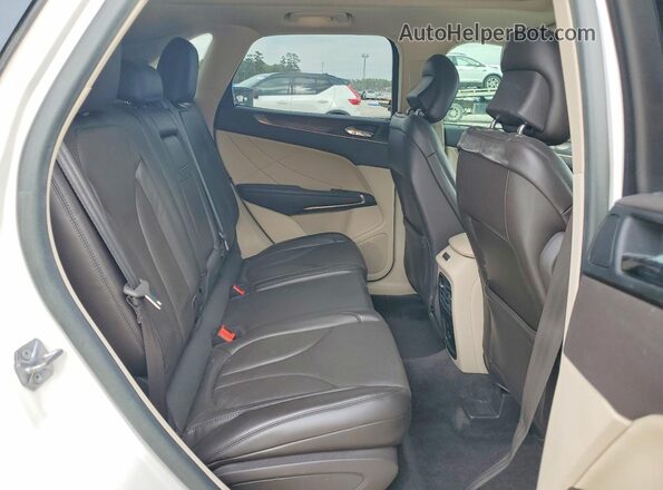 5LMCJ3C98KUL00847 2019 LINCOLN MKC White Vista interior trasera