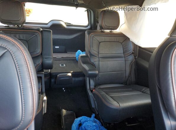 5LMJJ2TG6PEL00217 2023 LINCOLN NAVIGATOR White Vista de los asientos traseros