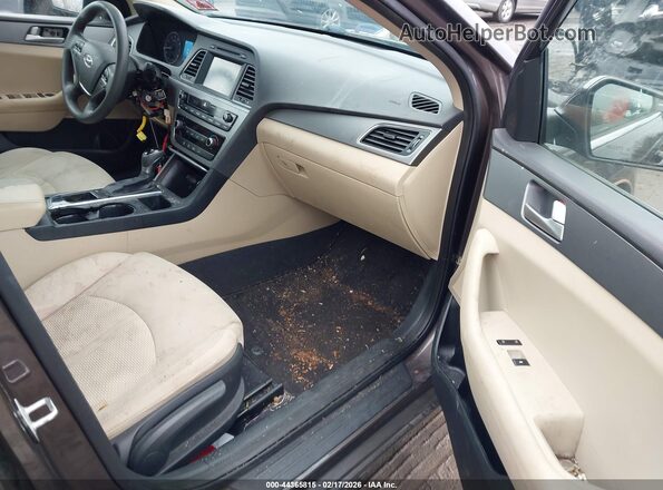 5NPE24AF0GH308616 2016 HYUNDAI SONATA Brown Вид салону спереду
