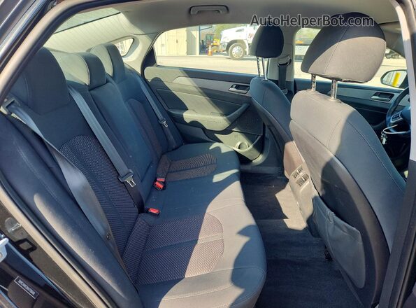 5NPE34AF2KH770648 2019 HYUNDAI SONATA Black Vista de los asientos traseros