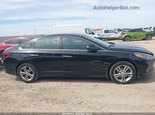 5NPE34AF9JH712891 2018 HYUNDAI SONATA Черный Вид задней части салона