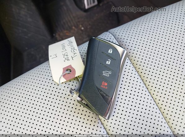 5TDABAB6XSS012176 2025 LEXUS TX 500H Silver Widok deski rozdzielczej
