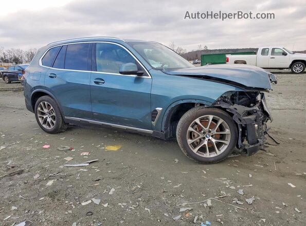 5UX13EU00R9V51734 2024 BMW X5 Бирюзовый Передняя правая четверть