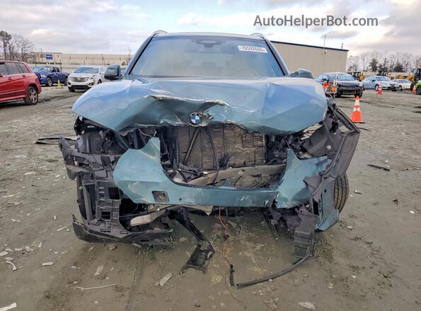 5UX13EU00R9V51734 2024 BMW X5 Бирюзовый Вид спереди