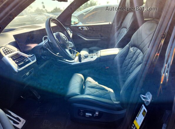 5UX23EM06P9R57826 2023 BMW X7 Black წინა სალონის ხედი