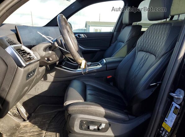 5UX23EU02R9U13343 2024 BMW X5 Blue Widok wnętrza z przodu