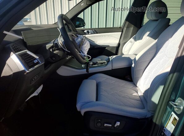5UX23EU07S9000243 2025 BMW X5 Teal Вид салону спереду