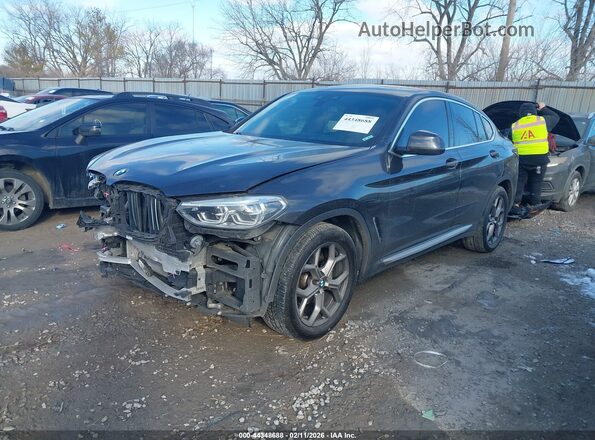5UX2V1C04M9H09934 2021 BMW X4 Black Առջևի ձախ երեք քառորդ տեսարան