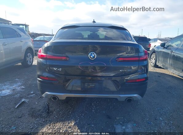 5UX2V1C04M9H09934 2021 BMW X4 Black 
