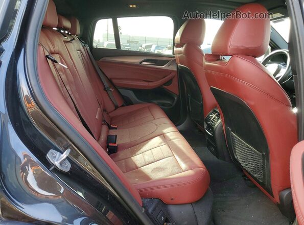 5UX2V5C05M9E14056 2021 BMW X4 Charcoal Widok tylnych siedzeń