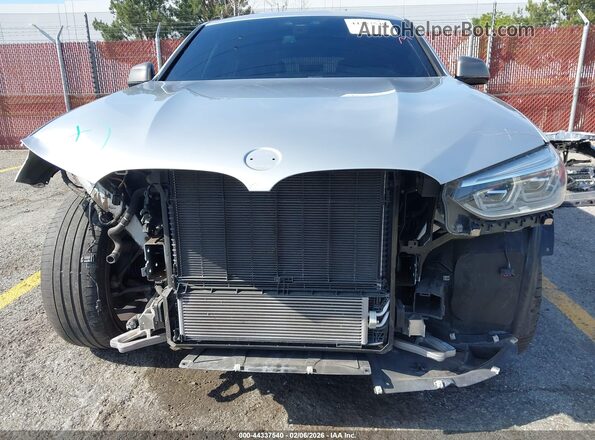 5UX2V5C08L9B53553 2020 BMW X4 Silver Vista interior trasera