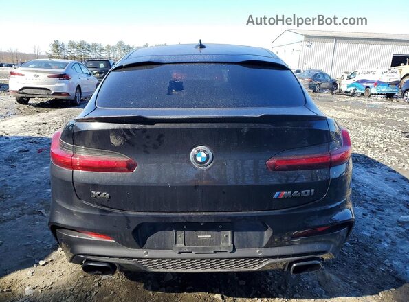 5UX2V5C08M9F12594 2021 BMW X4 Black Rear view