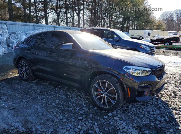 5UX2V5C08M9F12594 2021 BMW X4 Black Front right