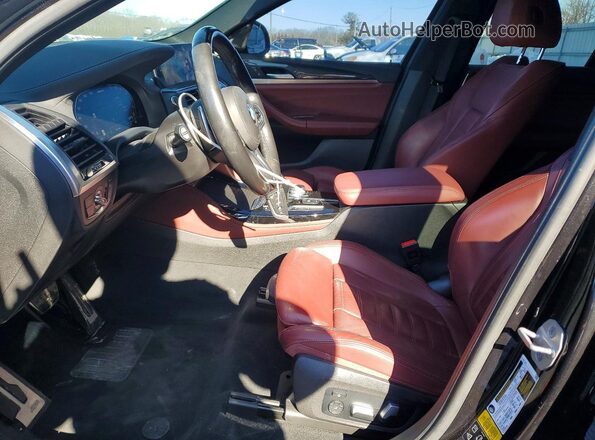 5UX2V5C08M9F12594 2021 BMW X4 Black Front interior view