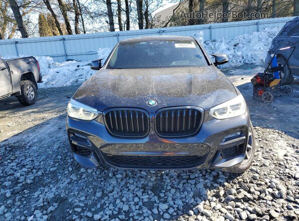 5UX2V5C08M9F12594 2021 BMW X4 Black Front view