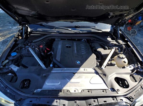 5UX2V5C08M9F12594 2021 BMW X4 Black Engine compartment view