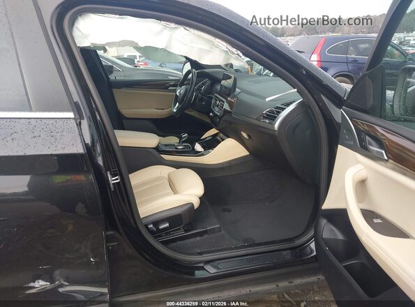 5UX33DT00P9N59995 2023 BMW X4 Черный Вид салона спереди