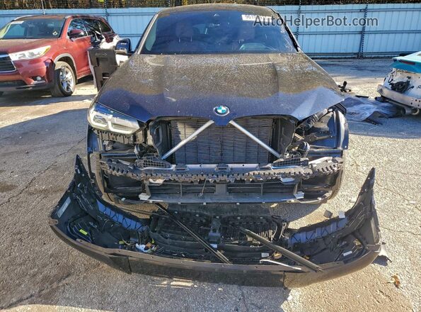 5UX33DT06R9V98271 2024 BMW X4 Black Front view