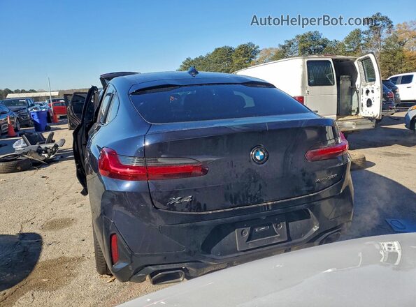 5UX33DT06R9V98271 2024 BMW X4 Black Rear view