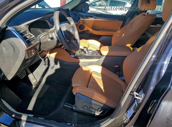 5UX33DT06R9V98271 2024 BMW X4 Black Front interior view