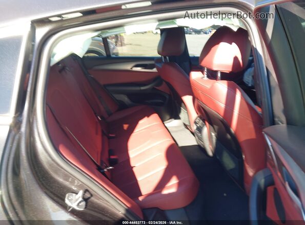 5UX33DT07N9K93520 2022 BMW X4 Black VIN კოდის სტიკერის ხედი