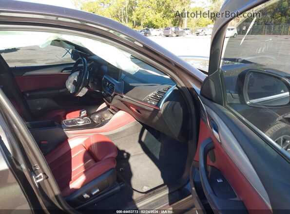 5UX33DT07N9K93520 2022 BMW X4 Black წინა სალონის ხედი