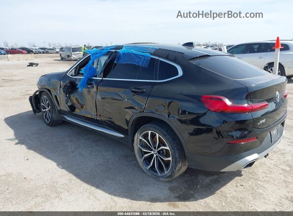 5UX33DT09N9J29170 2022 BMW X4 Black Вид задньої частини салону