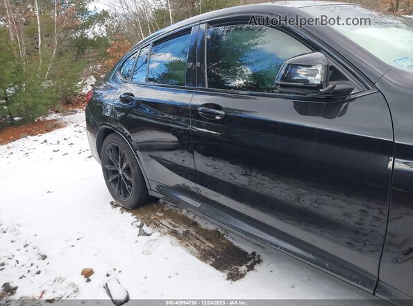 5UX33DT0XS9Y22874 2025 BMW X4 Black Front interior view
