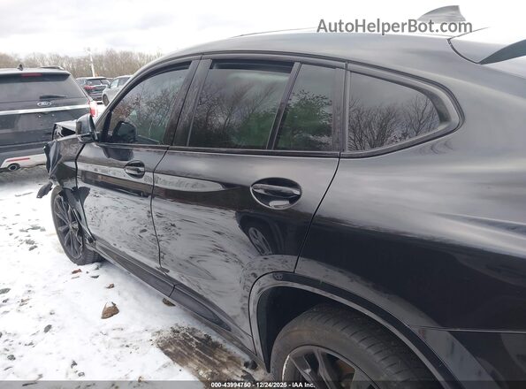 5UX33DT0XS9Y22874 2025 BMW X4 Black Rear interior view