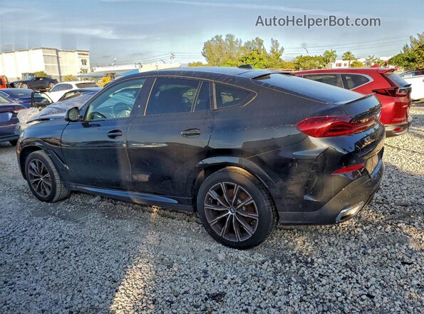 5UX33EX01R9V05379 2024 BMW X6 Black Trasero izquierdo