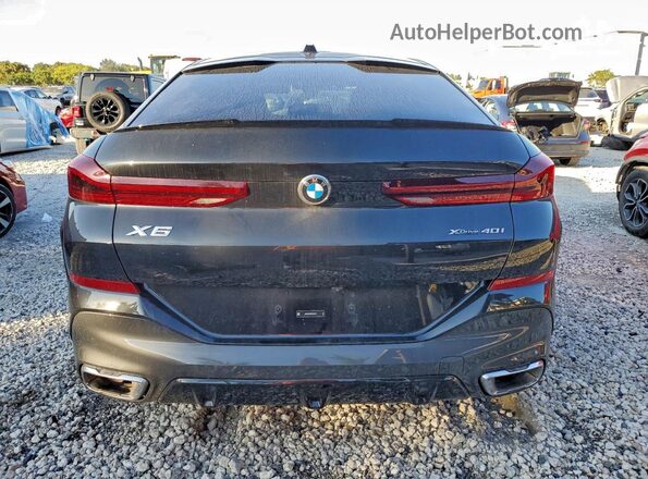 5UX33EX01R9V05379 2024 BMW X6 Black Vista trasera