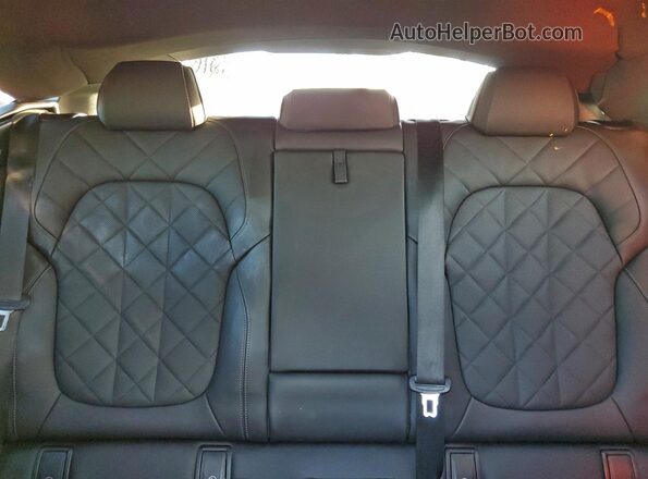 5UX33EX01R9V05379 2024 BMW X6 Black Vista de los asientos traseros