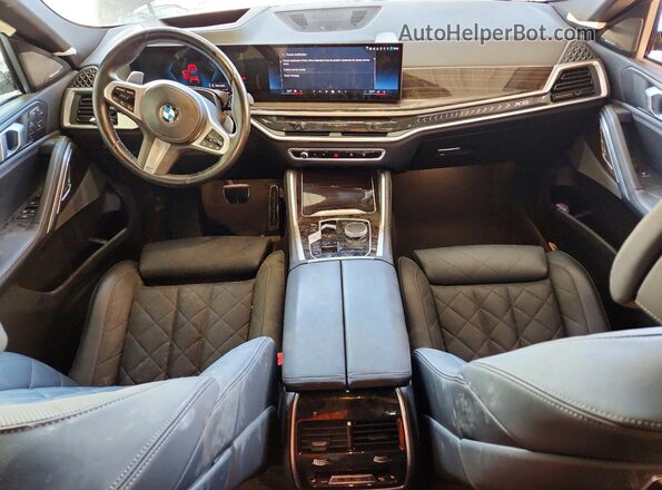 5UX33EX08S9W74479 2025 BMW X6 Black Vista del salpicadero