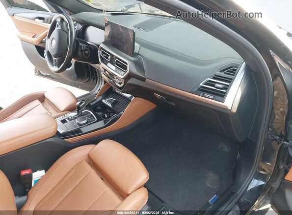 5UX43DT02P9P23848 2023 BMW X4 Black Vista interior delantera