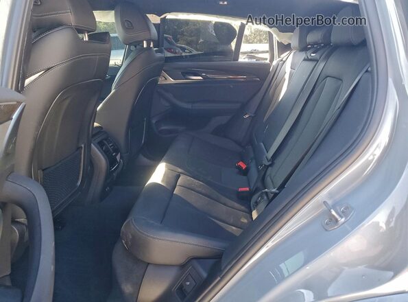 5UX43DT02S9Y06057 2025 BMW X4 Gray Rear interior view