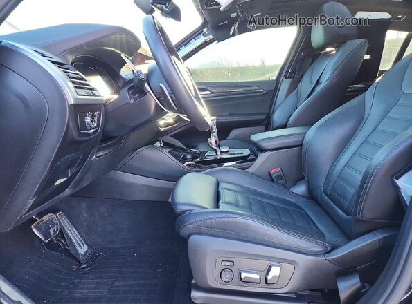 5UX43DT08N9J25101 2022 BMW X4 Blue Front interior view