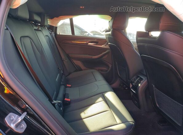 5UX43DT08R9W26883 2024 BMW X4 Black Rear interior view